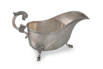 Lot 537 - A MODERN ROYAL IRISH SILVER HELMET SHAPED...