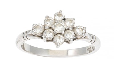 Lot 42 - A DIAMOND CLUSTER RING, of lozenge form, the...