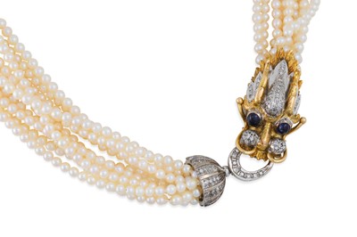 Lot 323 - A MULTI-STRANDED SEED PEARL NECKLACE, to a...