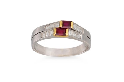 Lot 348 - A RUBY AND DIAMOND RING, set with princess cut...