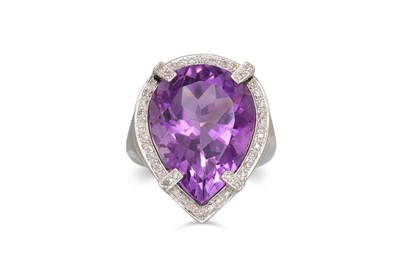 Lot 37 - AN AMETHYST AND DIAMOND CLUSTER RING, the pear...
