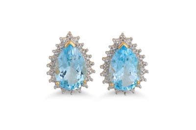 Lot 49 - A PAIR OF DIAMOND AND BLUE TOPAZ EARRINGS, the...