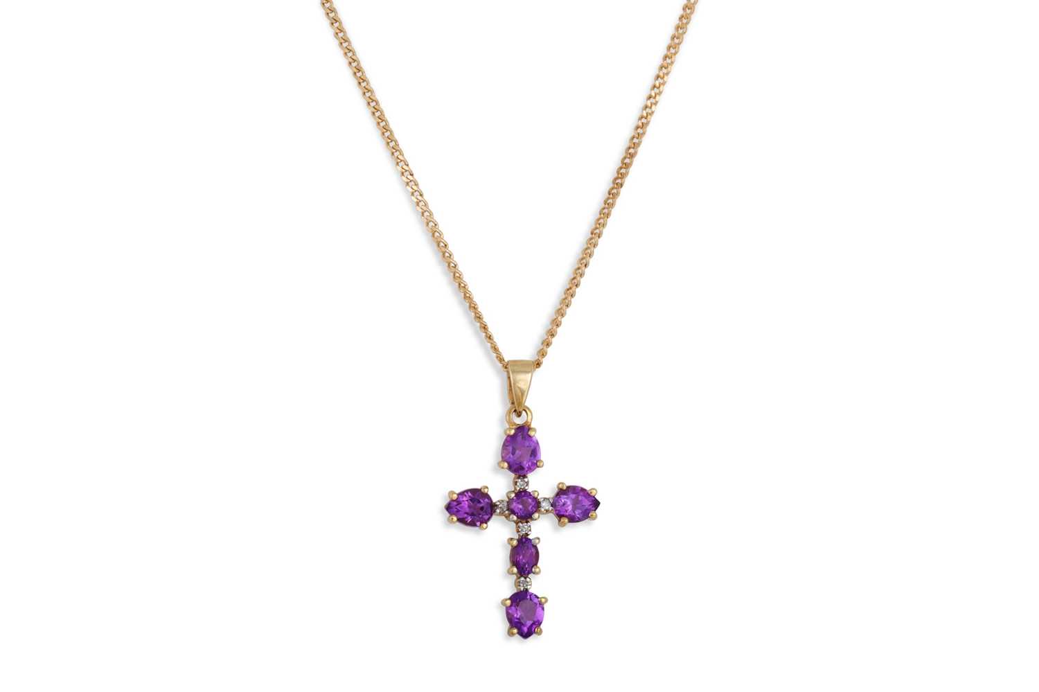 Lot 76 - A DIAMOND AND AMETHYST CROSS, mounted in gold...