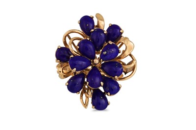 Lot 86 - A LAPIS LAZULI CLUSTER RING, the pear shaped...