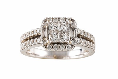 Lot 293 - A DIAMOND CLUSTER RING, the princess, baguette...