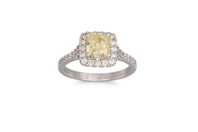 Lot 256 - A YELLOW DIAMOND RING, the radiant cut diamond...