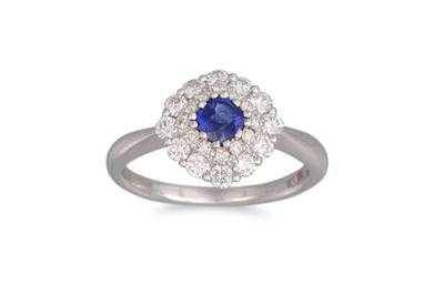 Lot 259 - A SAPPHIRE AND DIAMOND CLUSTER RING, the...