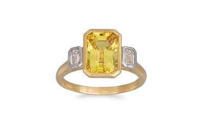 Lot 263 - A YELLOW SAPPHIRE AND DIAMOND RING, the...