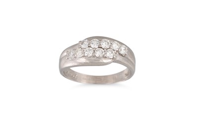 Lot 393 - A TWO ROWED DIAMOND RING, the brilliant cut...