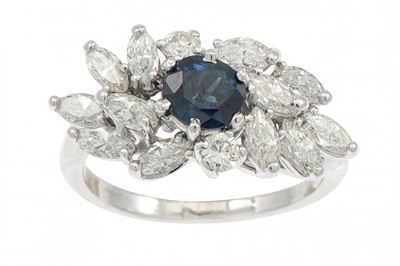 Lot 368 - A SAPPHIRE AND DIAMOND CLUSTER RING, the oval...