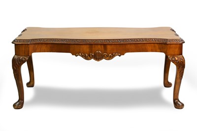 Lot 509 - A SHAPED BURR WALNUT COFFEE TABLE, serpentine...