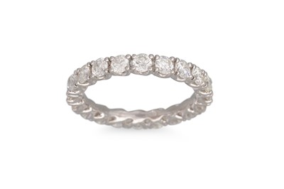 Lot 197 - A DIAMOND ETERNITY RING, the brilliant cut...