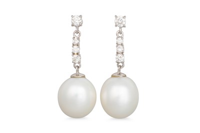 Lot 254 - A PAIR OF DIAMOND AND PEARL DROP EARRINGS, the...