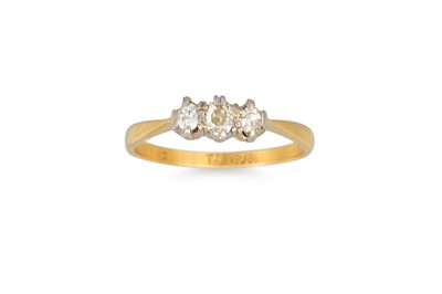 Lot 57 - A DIAMOND THREE STONE RING, mounted in 18ct...