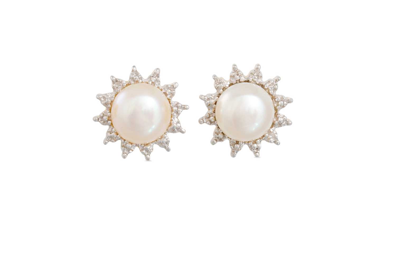 Lot 57 - A PAIR OF DIAMOND AND PEARL EARRINGS, mounted...