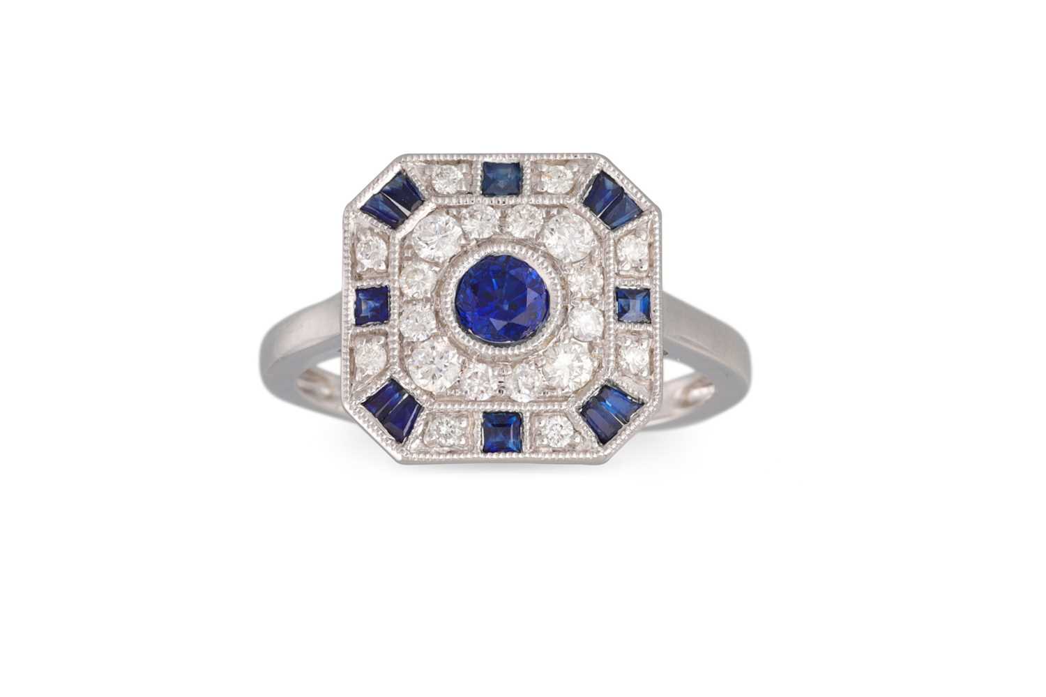 Lot 59 - A DIAMOND AND SAPPHIRE CLUSTER RING, mounted...