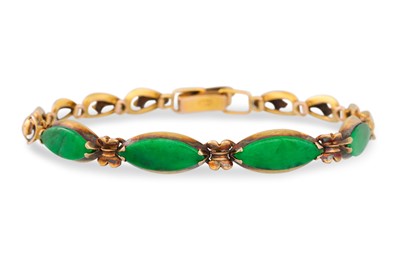 Lot 118 - A JADE BRACELET, the oval jade to gold spacers