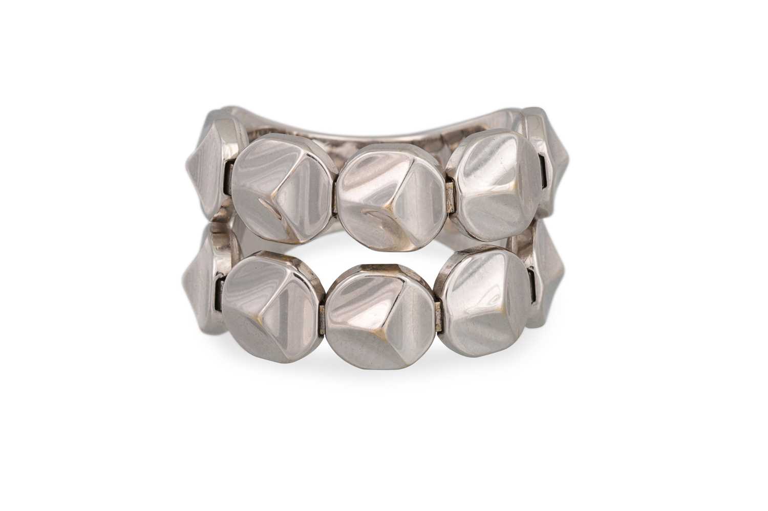 Lot 1 - AN 18CT WHITE GOLD RING, of flexible shaped...