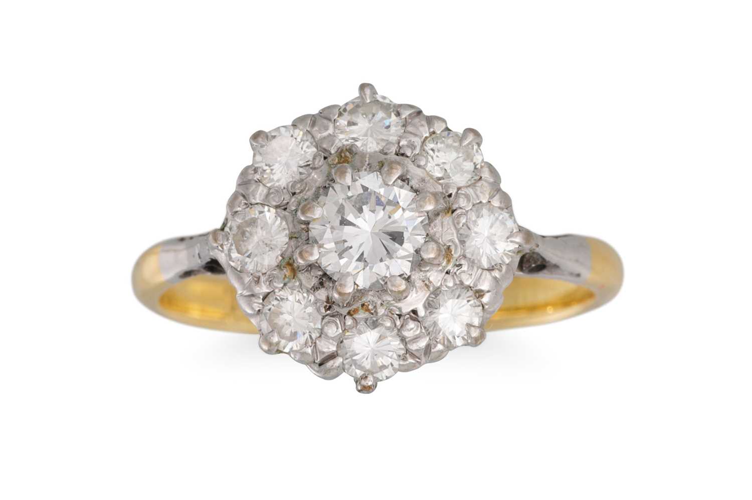 Lot 65 - A DIAMOND CLUSTER RING, set with a brilliant...