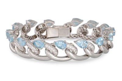 Lot 357 - AN AQUAMARINE AND DIAMOND BRACELET, the curved...