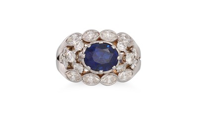 Lot 276 - A SAPPHIRE AND DIAMOND RING, the oval sapphire...