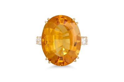 Lot 277 - A CITRINE AND DIAMOND RING, the large oval...