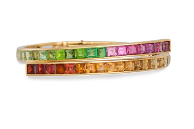 Lot 281 - A TOPAZ, CITRINE & TOURMALINE HINGED BANGLE,...