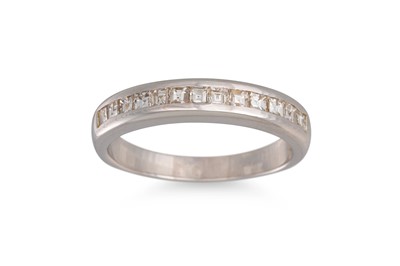 Lot 284 - A DIAMOND HALF ETERNITY RING, the princess cut...