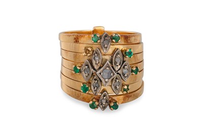 Lot 286 - A VINTAGE GEM SET RING, comprising seven bands...