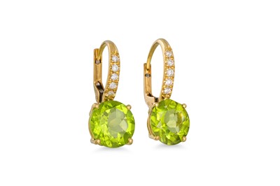 Lot 320 - A PAIR OF PERIDOT AND DIAMOND EARRINGS, the...