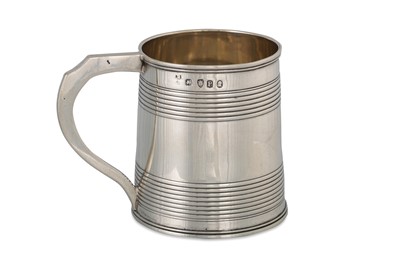 Lot 513 - A GEORGE III SILVER CHRISTENING MUG, with...