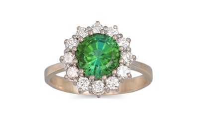 Lot 109 - A GREEN TOURMALINE AND DIAMOND CLUSTER RING,...