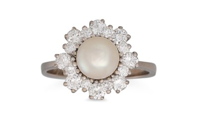 Lot 111 - A PEARL AND DIAMOND CLUSTER RING, the central...