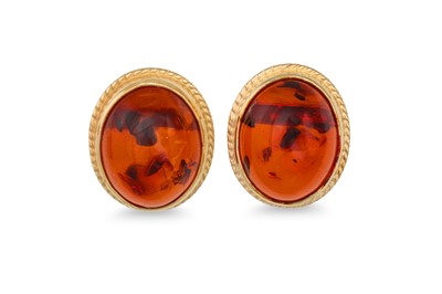 Lot 24 - A PAIR OF RESIN SET EARRINGS, the oval...