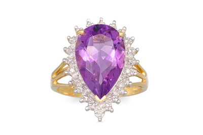 Lot 32 - AN AMETHYST AND DIAMOND RING, the pear shaped...