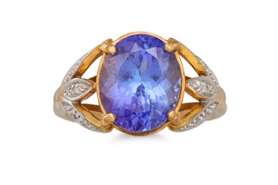 Lot 10 - A TANZANITE AND DIAMOND RING, the oval...