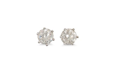 Lot 254 - A PAIR OF DIAMOND STUD EARRINGS, the round...