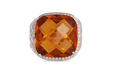 Lot 289 - A CITRINE AND DIAMOND RING, the large princess...