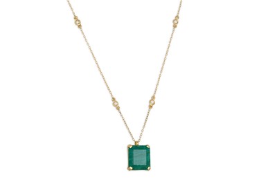 Lot 299 - AN EMERALD AND DIAMOND PENDANT, the...