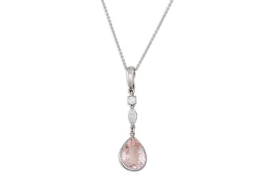 Lot 309 - A MORGANITE AND DIAMOND PENDANT, the pear...