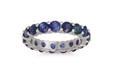 Lot 247 - A FULL BAND SAPPHIRE ETERNITY RING, mounted in...