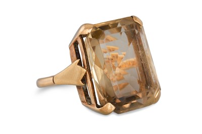 Lot 53 - A SMOKY QUARTZ DRESS RING, mounted in 9ct...