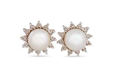 Lot 24 - A PAIR OF CULTURED PEARL EARRINGS, the pearl...