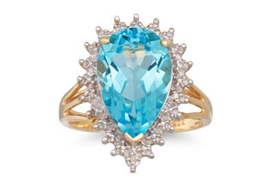 Lot 28 - A BLUE TOPAZ AND DIAMOND RING, the pear shaped...