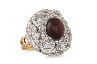 Lot 32 - A DIAMOND AND GARNET CLUSTER RING, the...