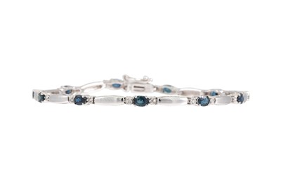 Lot 309 - A SAPPHIRE BRACELET, mounted in 14ct white...