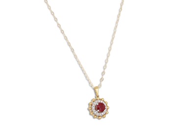Lot 46 - A RUBY AND DIAMOND CLUSTER PENDANT, mounted in...