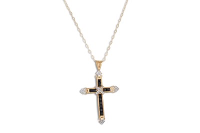 Lot 73 - A SAPPHIRE AND DIAMOND CROSS, the square cut...