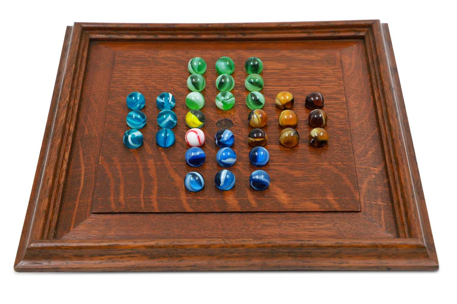 Lot 267 - AN EDWARDIAN OAK SOLITAIRE GAME, with glass...