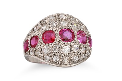 Lot 195 - A PINK SAPPHIRE AND DIAMOND BOMBÉ SHAPED RING,...